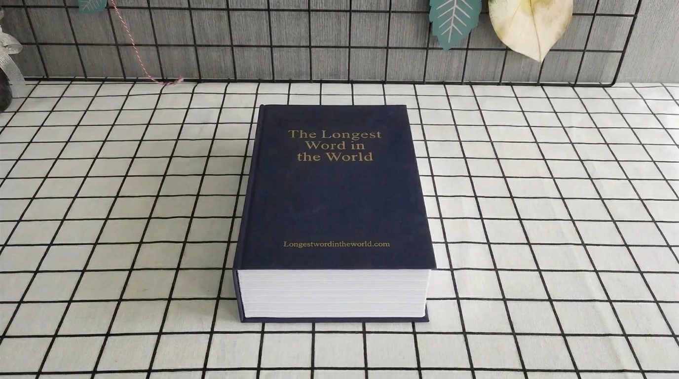 A book with titled The longest word in the World lying on a table